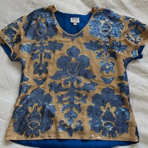 Sequin/ satin blue and cream blouse, can dress up with a pair of white pants!